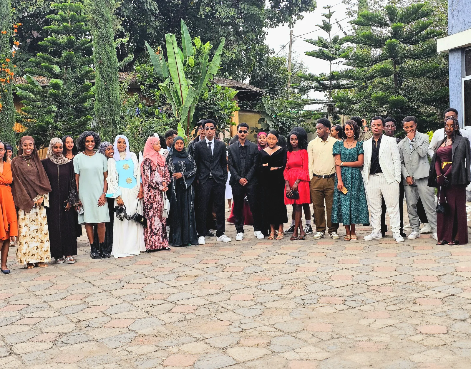 A large group gathered for a school closing ceremony