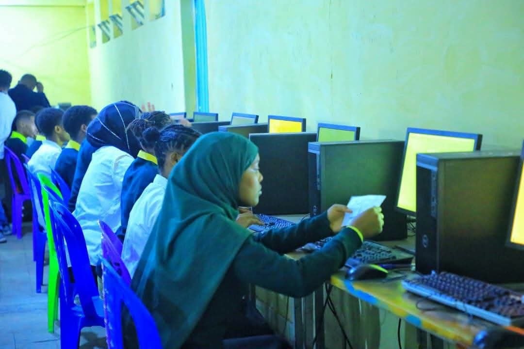 Students working at computers in an ICT lab