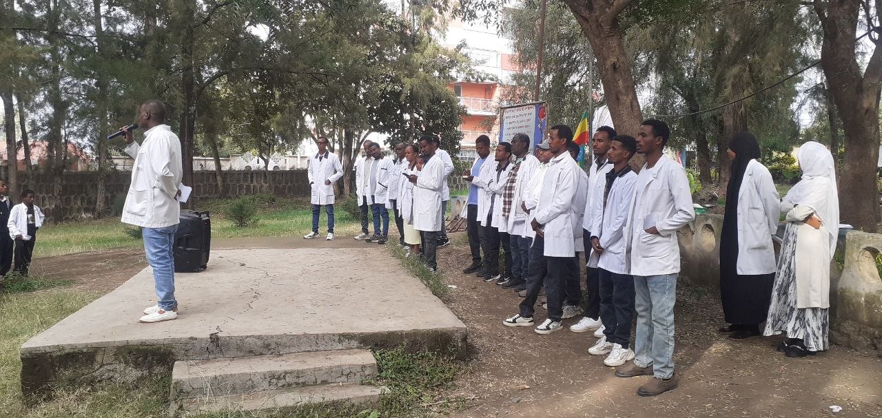 Teachers gathered in the school grounds